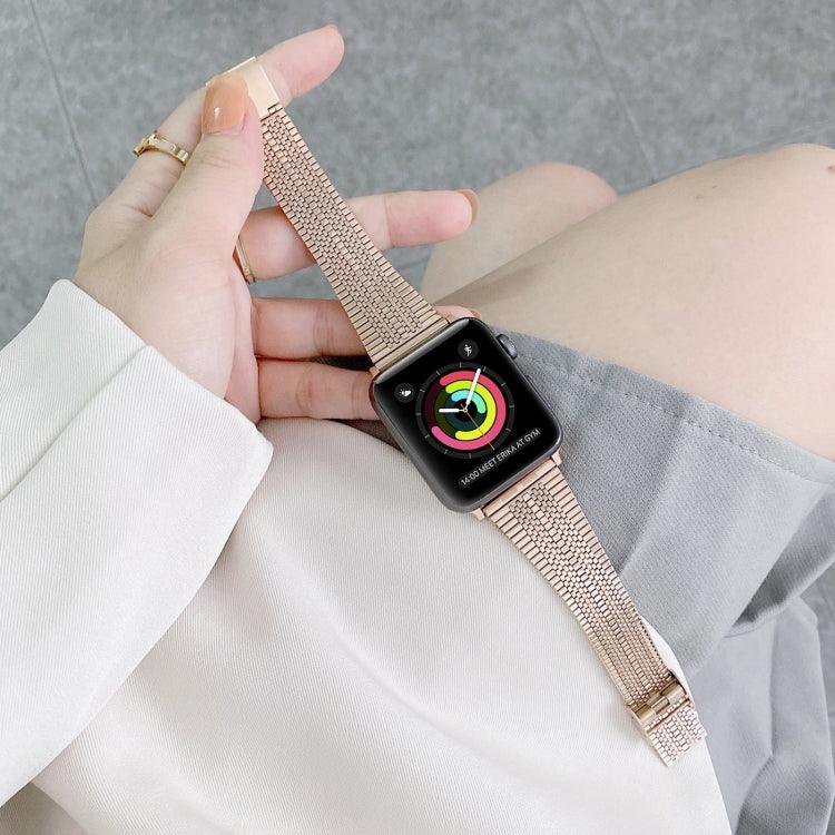 Apple Watch with double lines steel replacement strap, showcasing vibrant watch face on wrist.